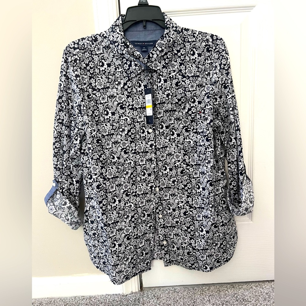 Woman’s Tommy Hilfiger NWT buttoned down top.